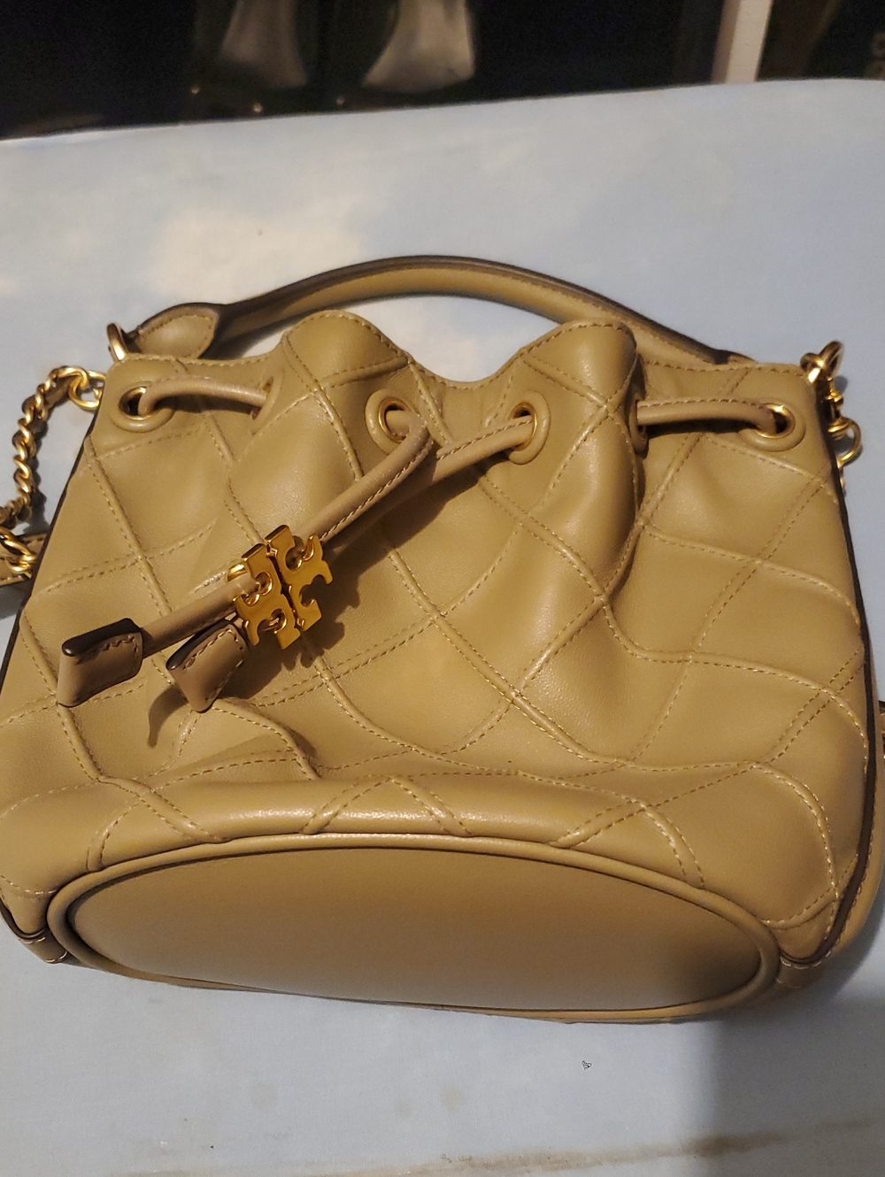 Tory Burch Quilted Drawstring Mini Bucket in Tan with Gold Hardware